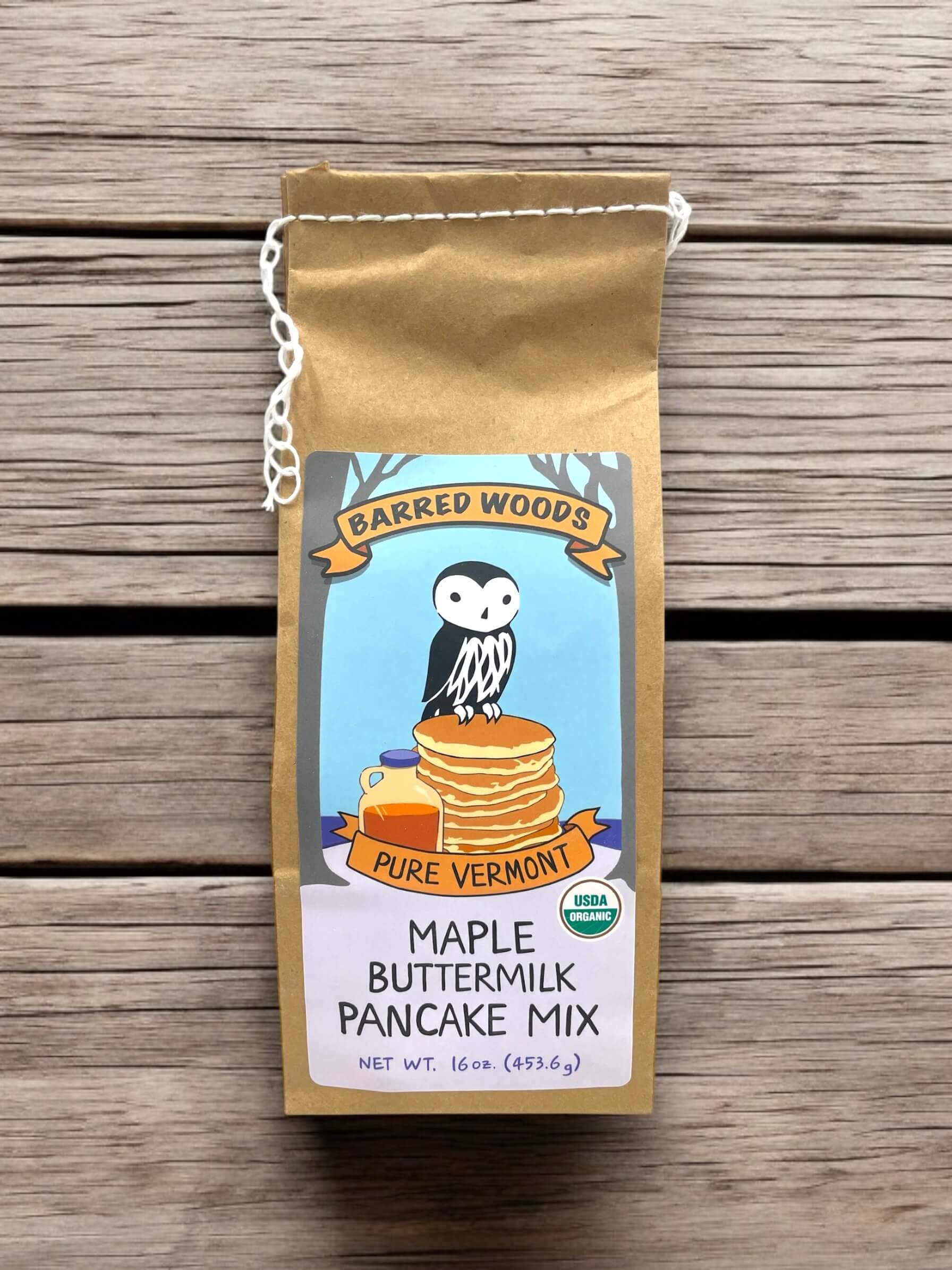 Brown bag of pancake mix with graphic owl on a stack of pancakes