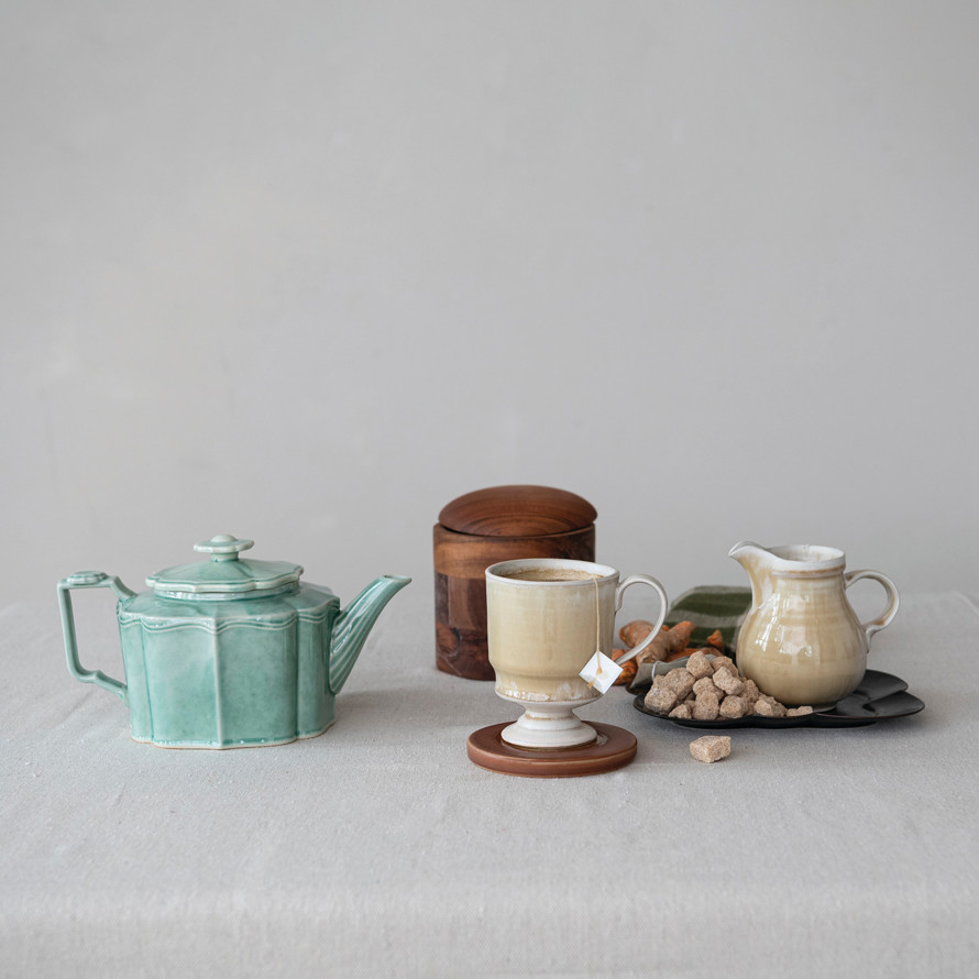 10 OZ. FOOTED MUG, TAN