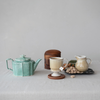 10 OZ. FOOTED MUG, TAN