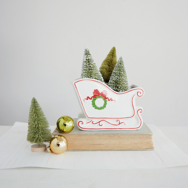 STONEWARE SLED SHAPED CONTAINER WITH WREATH & BOW