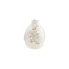 White ceramic vase with floral designs on a white background