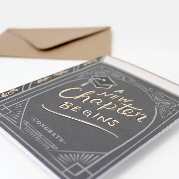 A NEW CHAPTER BEGINS - GRADUATION CARD