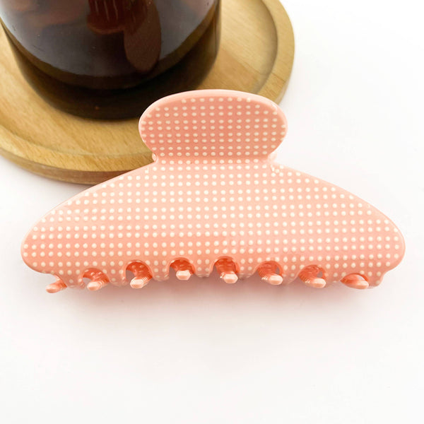 Pink hair claw clip on a white background