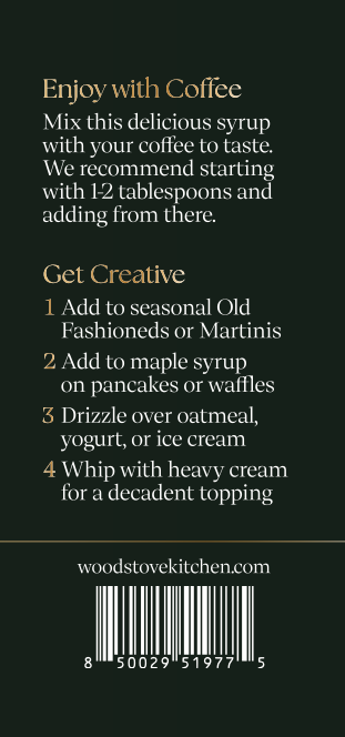 Back cover of a Woodstove Kitchen recipe book or booklet on a dark green background, with gold text reading 'Enjoy with Coffee' and 'Get Creative,' a website URL, and a barcode at the bottom.