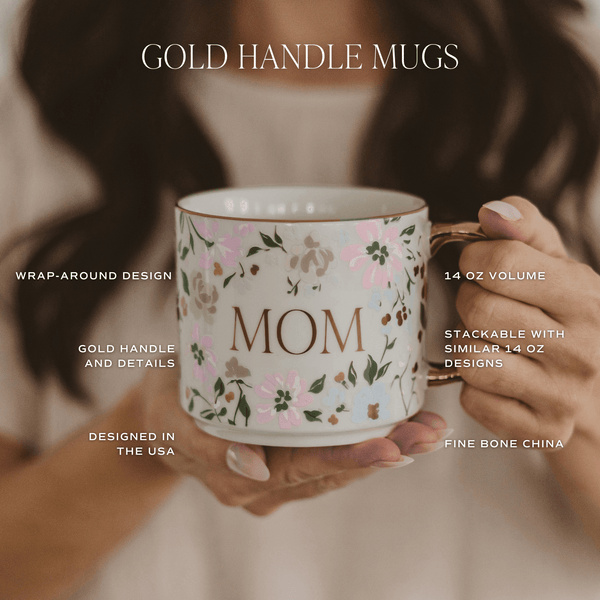 Mug with floral design and 'MOM' text, held by a person, with product details overlay.
