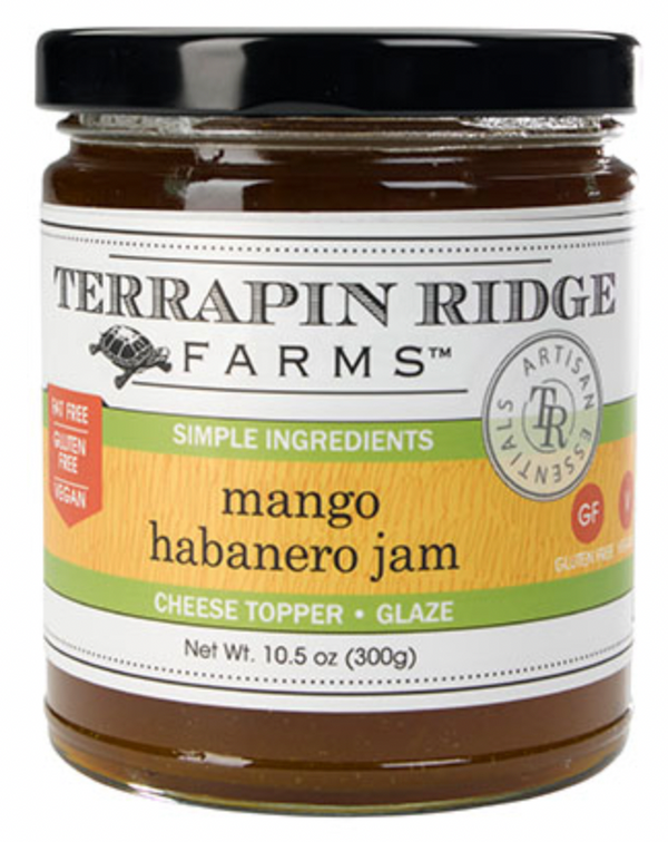 A jar of Terrapin Ridge Farms Mango Habanero Jam with the label facing forward. The label indicates the jam is a cheese topper and that it is GMO-free.